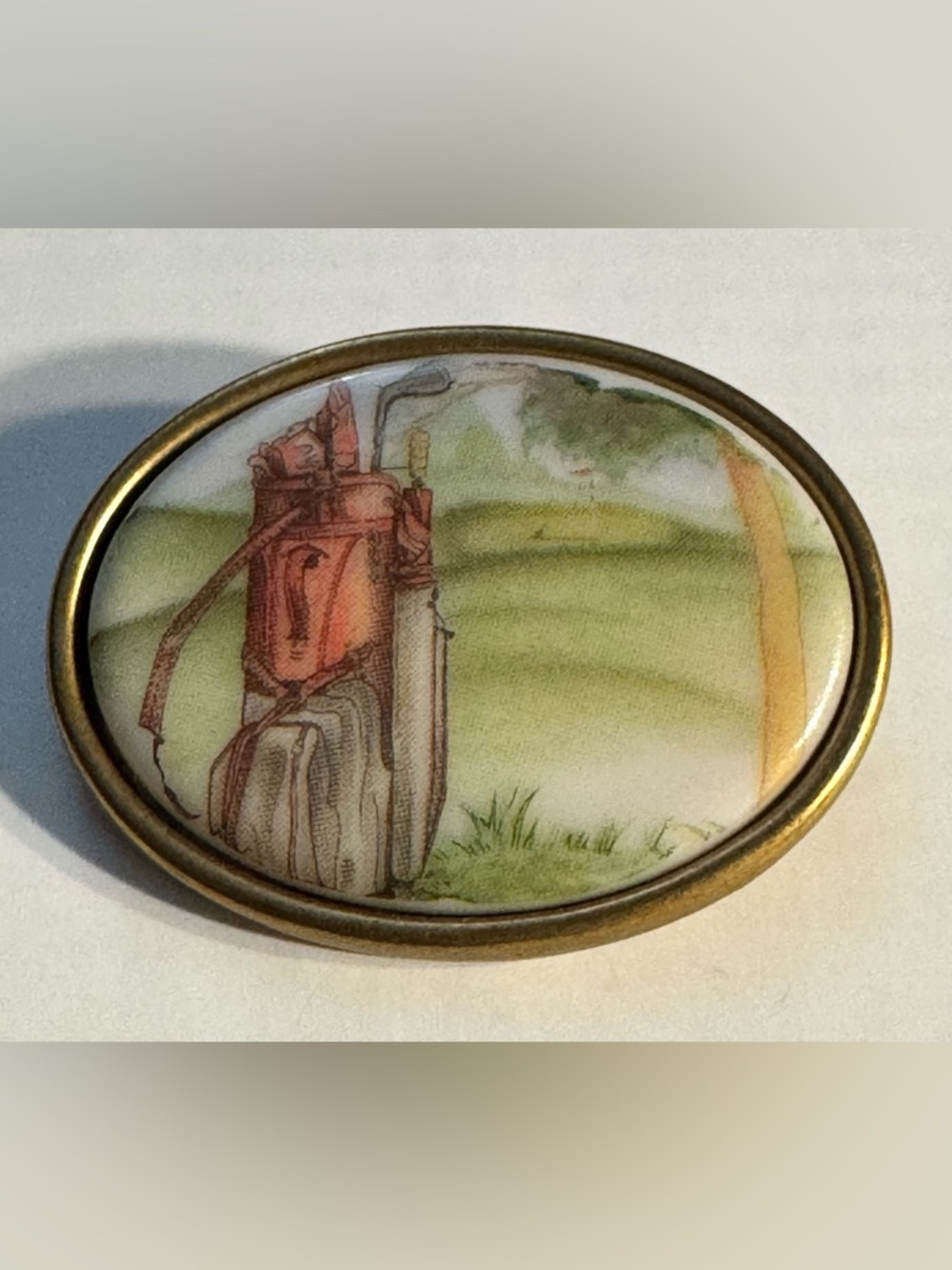 Hand Painted porcelain golf theme brooch